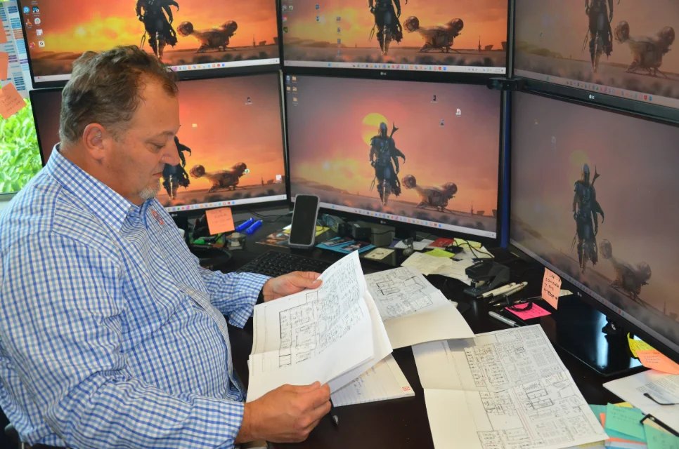 Prosper Solutions engineer reviewing building system plans