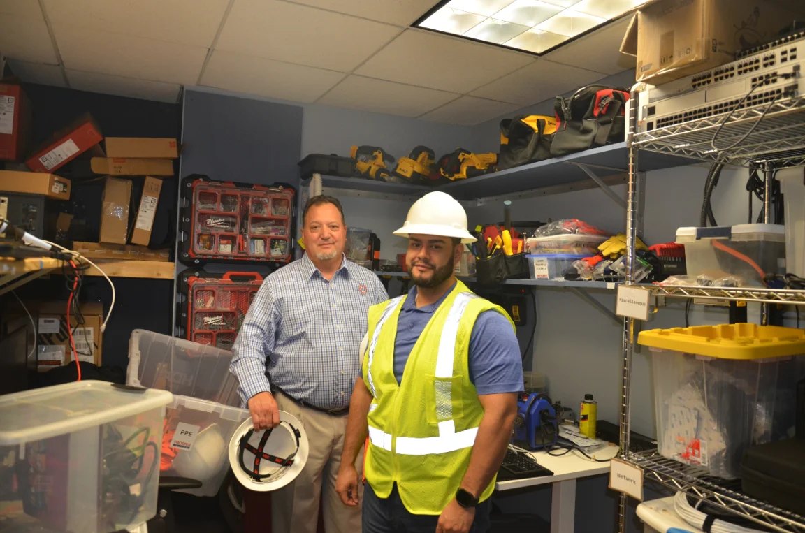 Prosper Solutions team in a building technology room