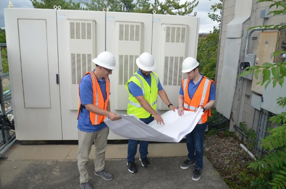 Prosper Solutions team reviewing plans on a redevelopment site